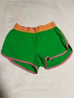 cotopaxi Green Athletic Shorts with Pink Trim and Yellow Waistband